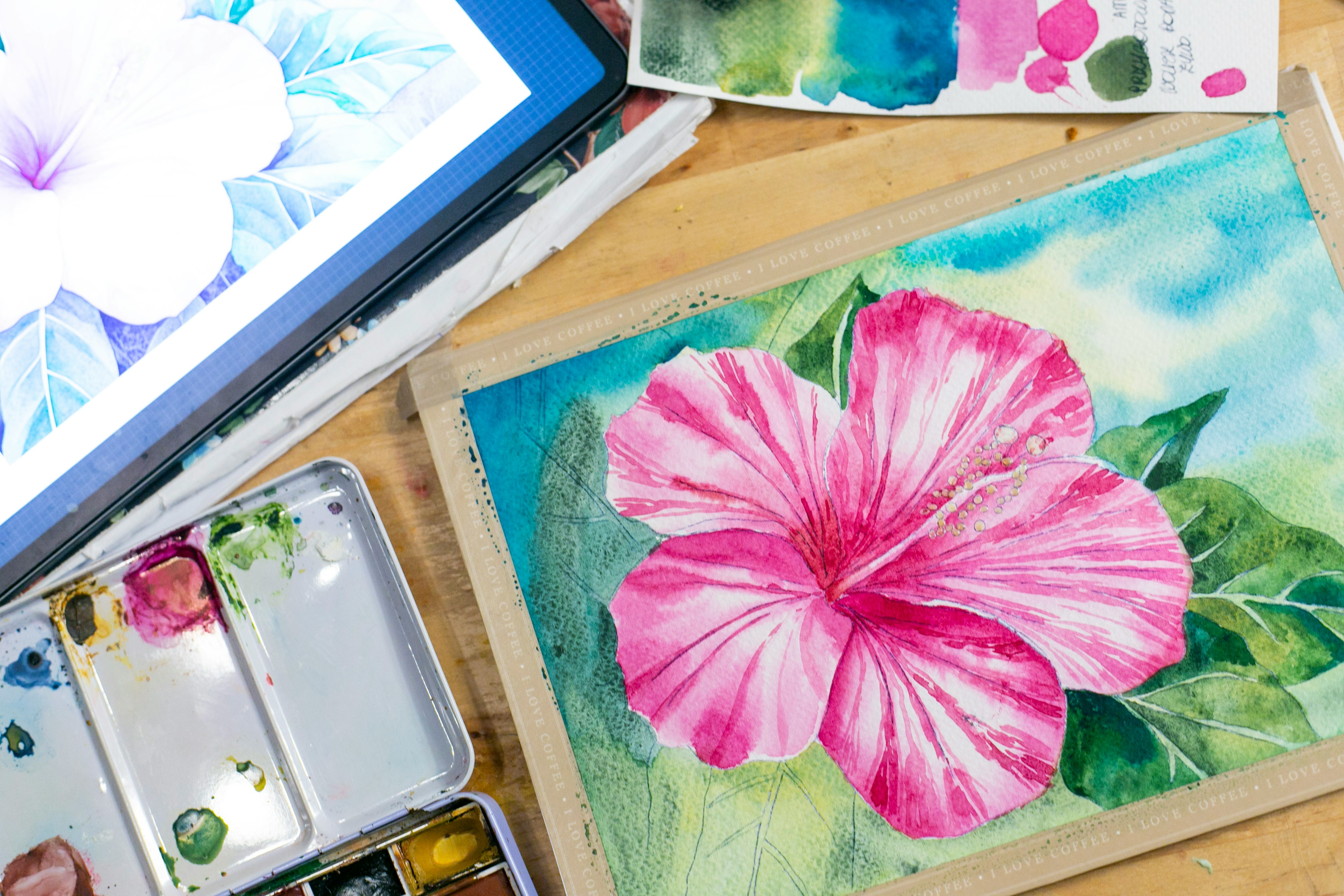 a painting of a flower on a table
