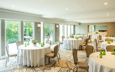 a room with tables and chairs