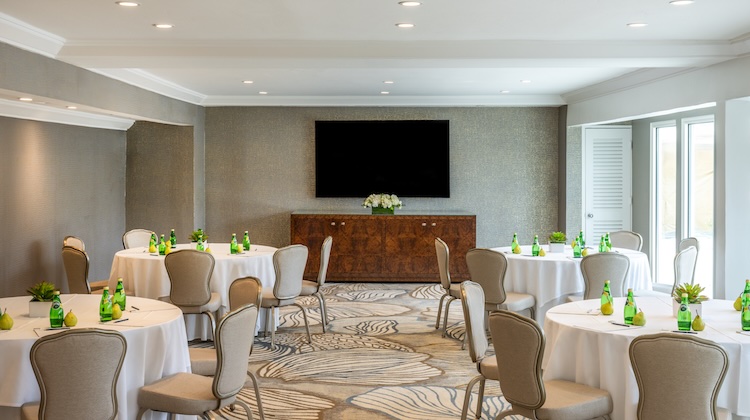 a room with tables and chairs