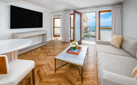 a living room with a television and a couch