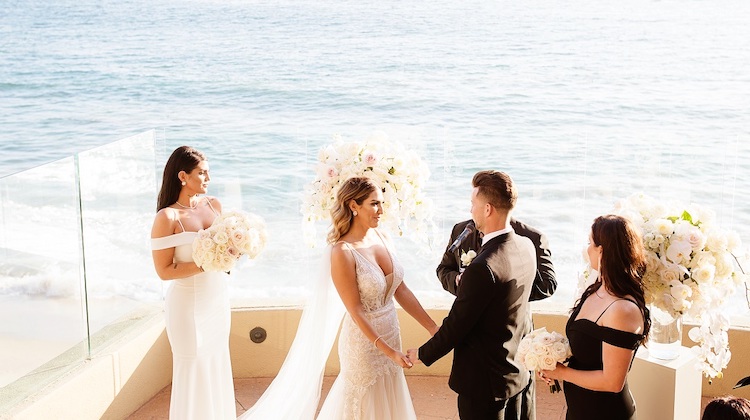 a group of people holding hands