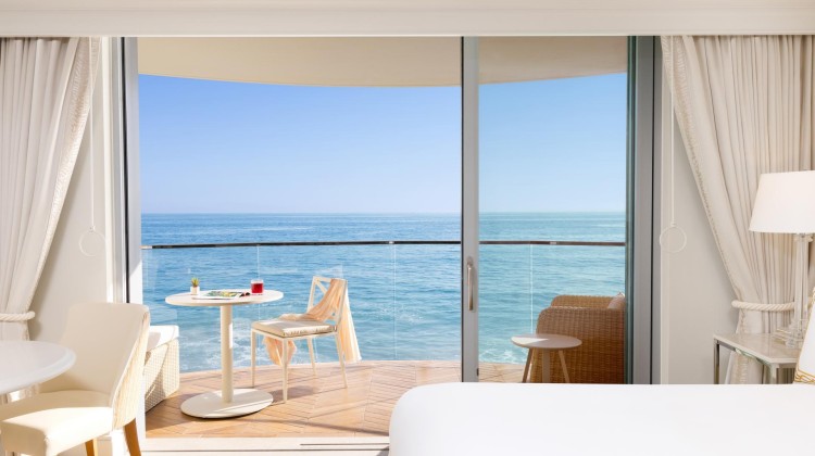 a room with a view of the ocean