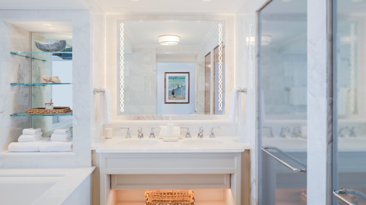 a bathroom with a mirror and sink