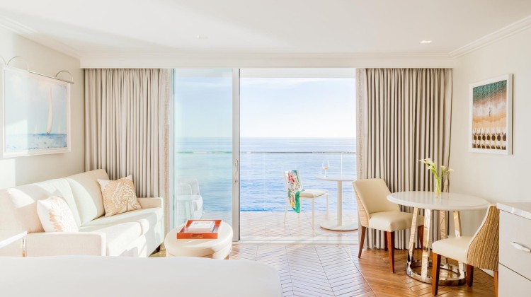 a room with a view of the ocean