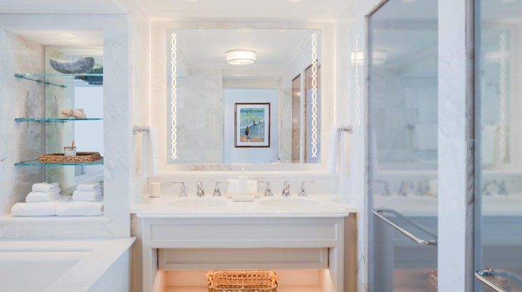 a bathroom with a mirror and sink