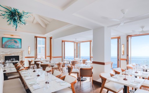 a room with tables and chairs