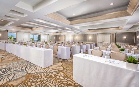 a room with tables and chairs