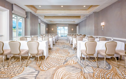 a room with tables and chairs