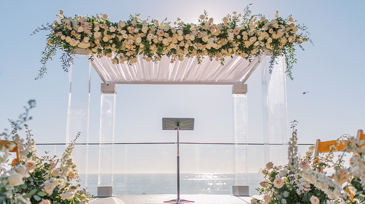 elegant floral arbor overlooking the ocean