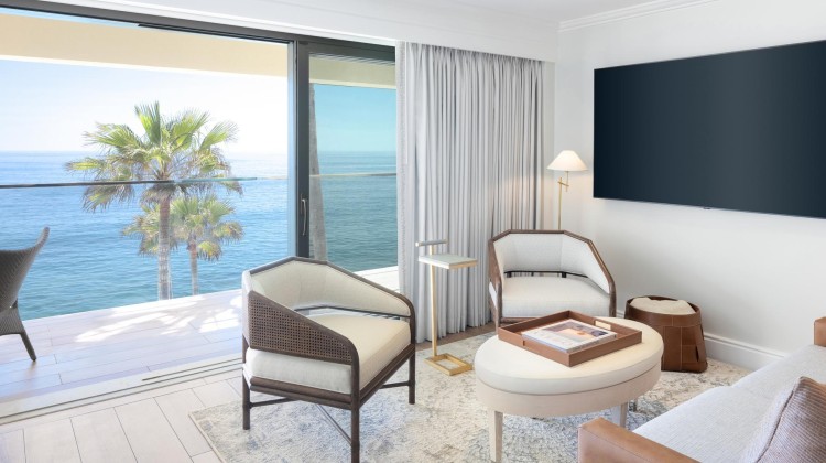 a room with a television and chairs