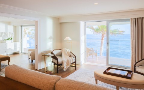a living room with a couch and a chair