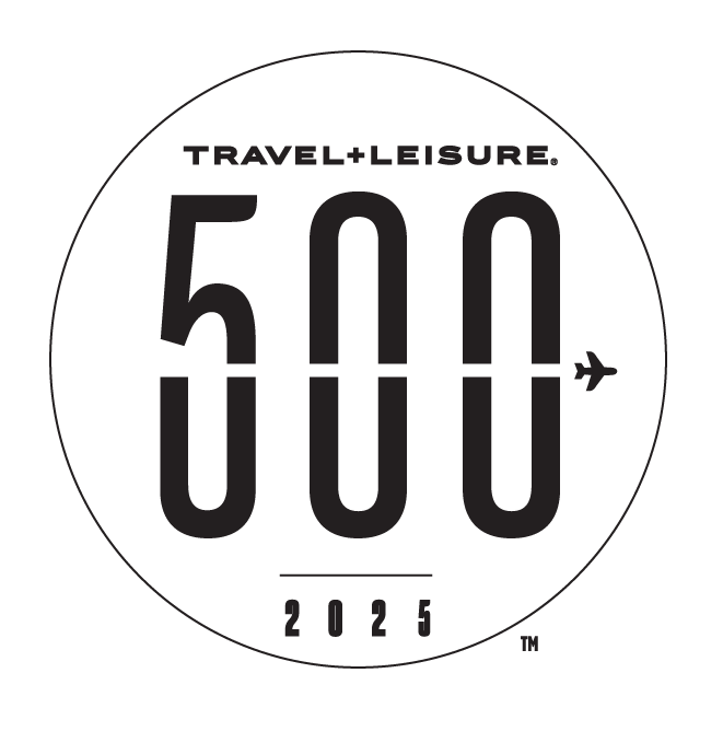a white circle with black numbers and a plane on it