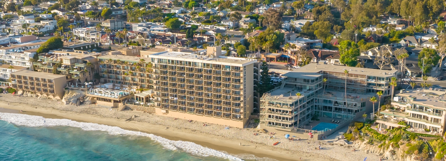 a large building on a beach