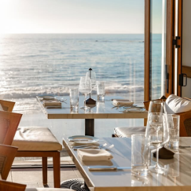 a table with glasses and plates on it