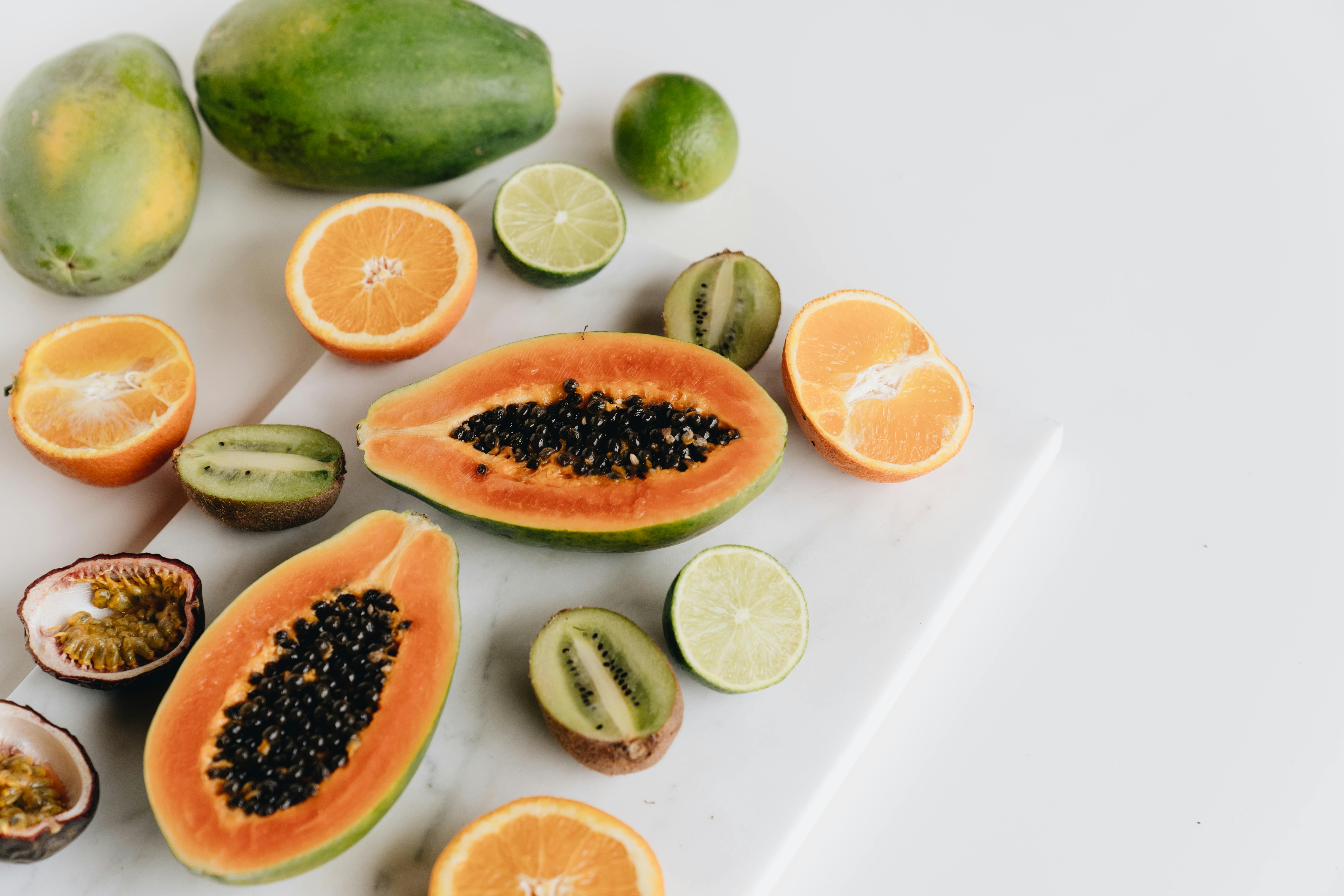 a group of fruit on a cutting board
