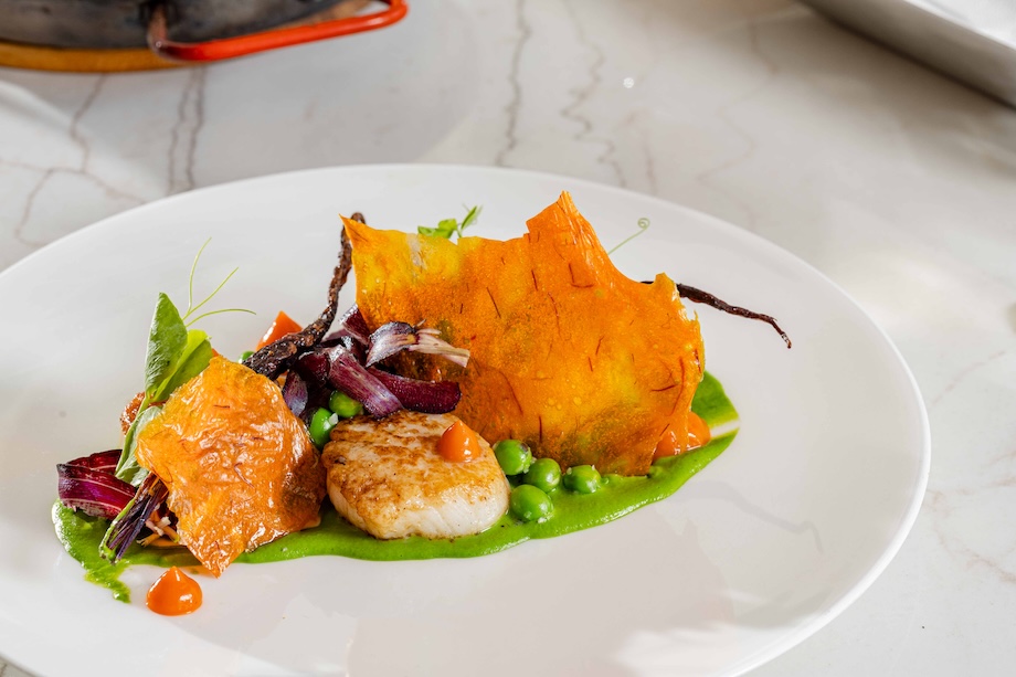 a plate of food on a marble table