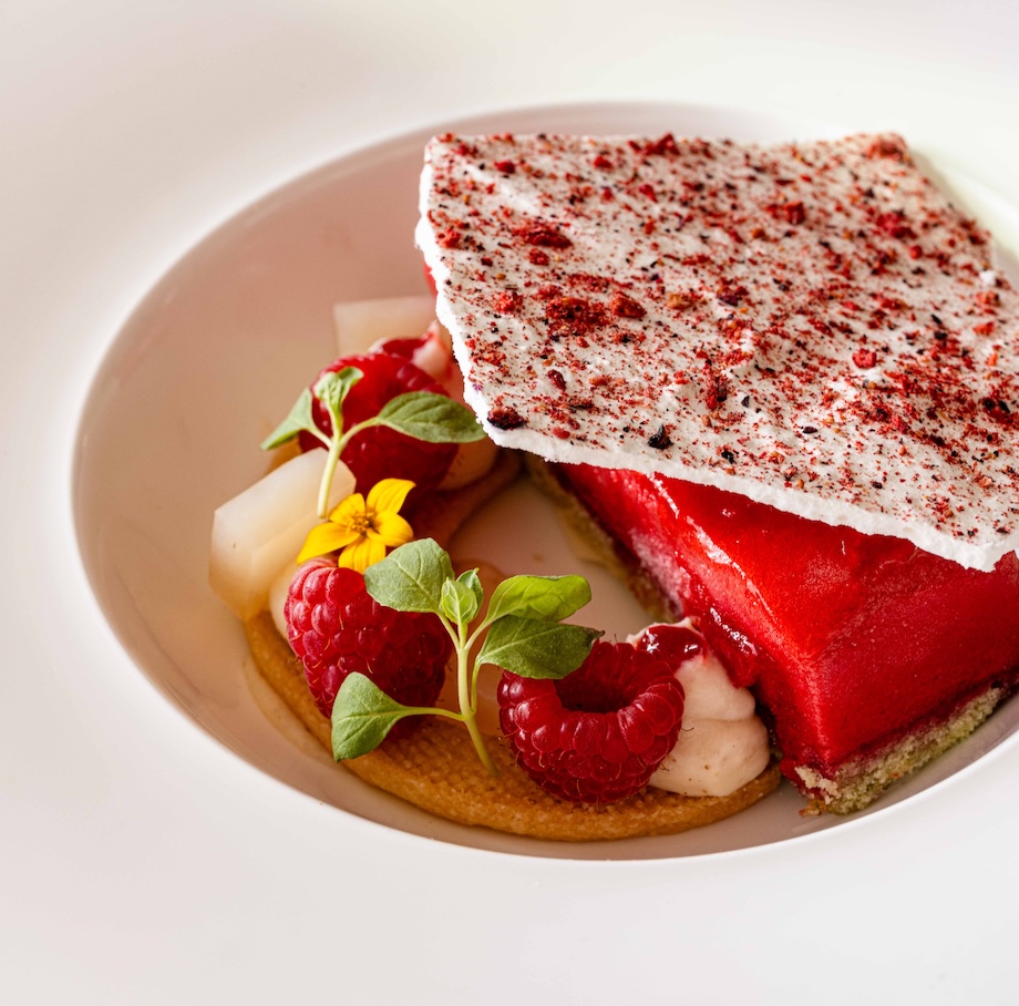 a plate of dessert with fruit on it