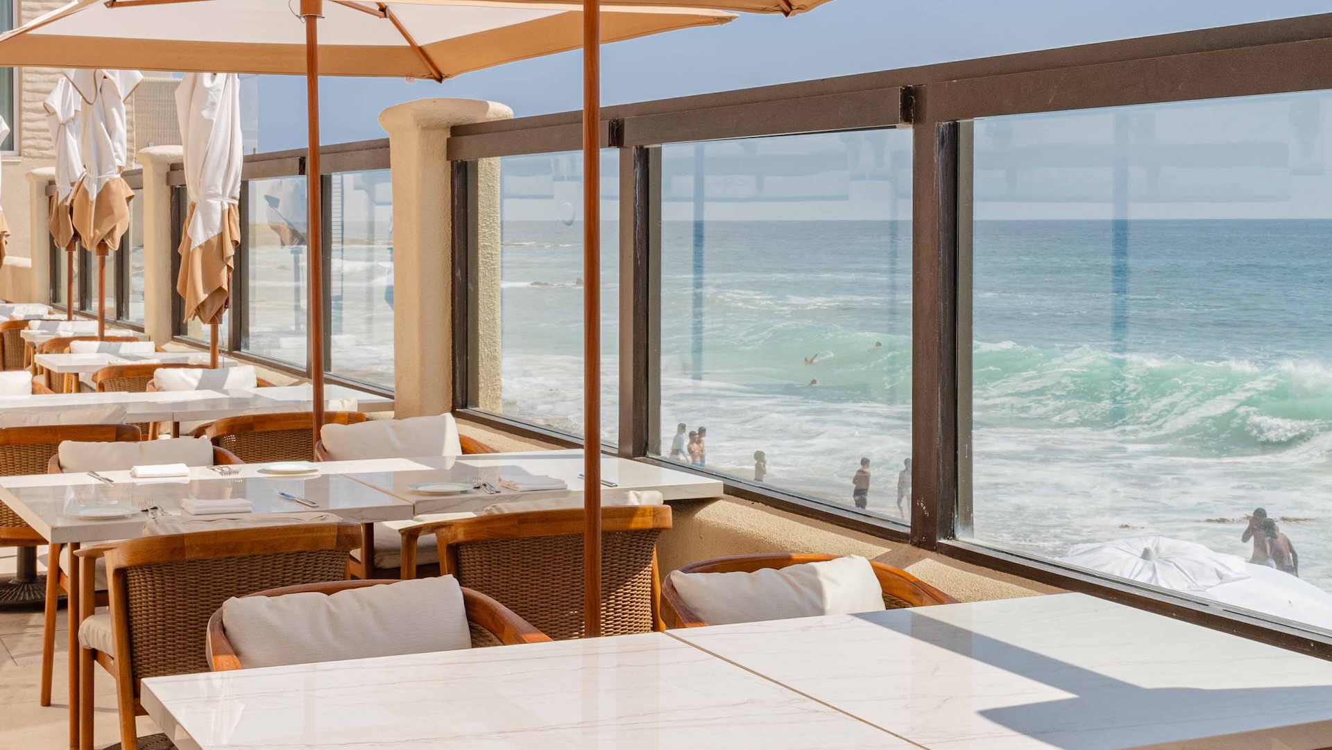 a restaurant with a view of the ocean