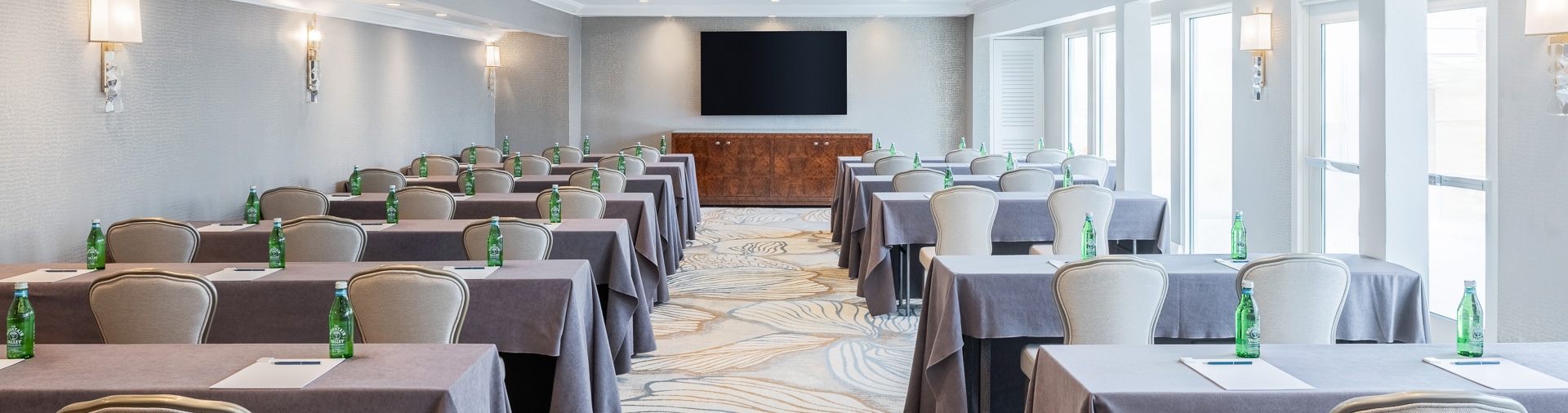 a room with tables and chairs
