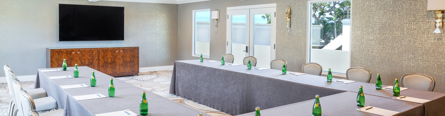 a table with green bottles on it
