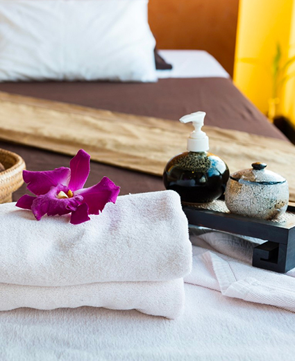 spa bed set up with amenities
