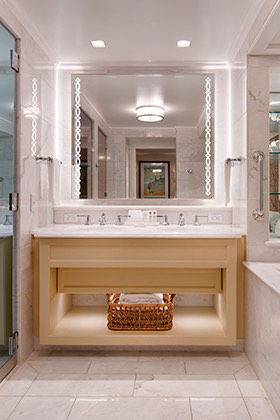 a bathroom with a large mirror