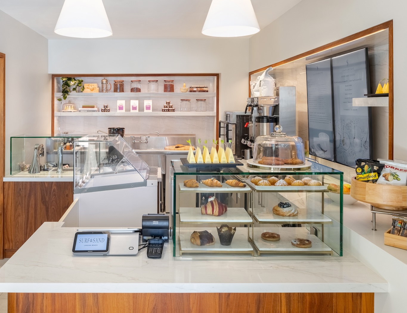 a counter with pastries and pastries on it