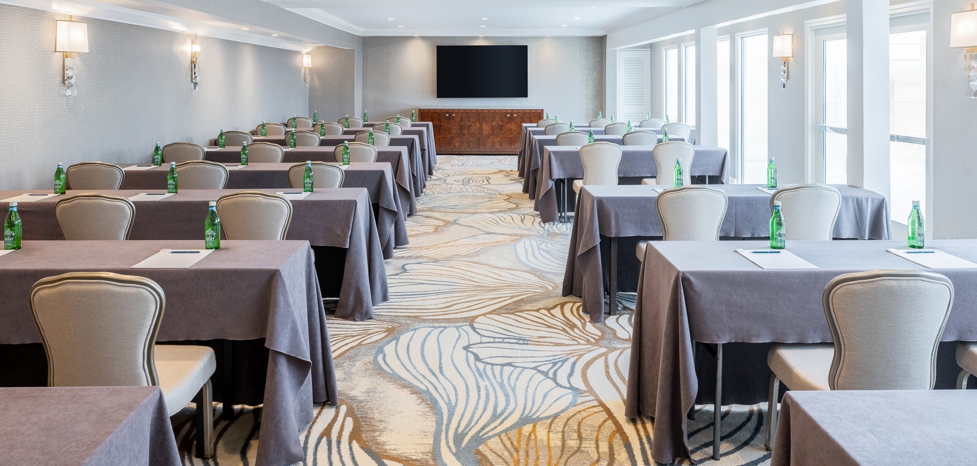a room with tables and chairs