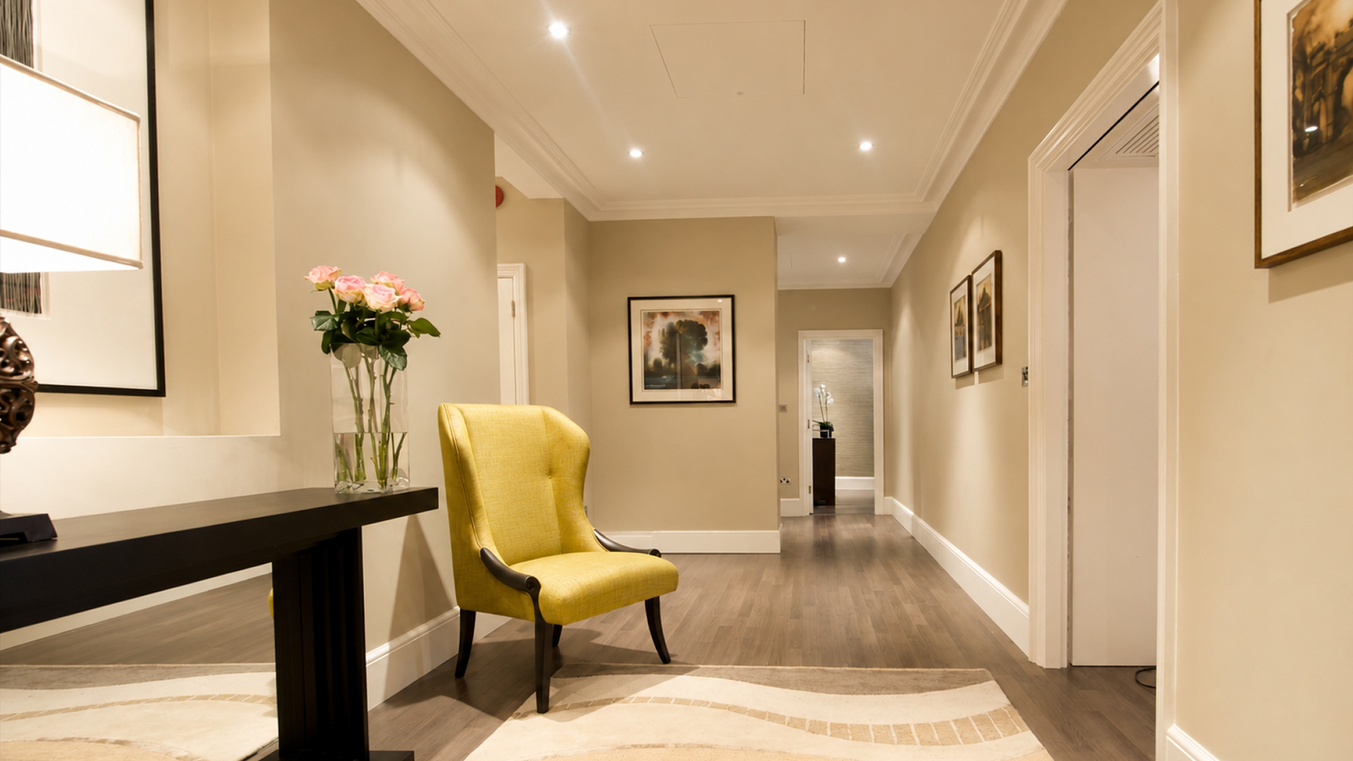 a yellow chair in a hallway