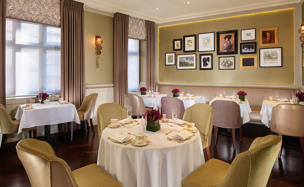 a room with tables and chairs