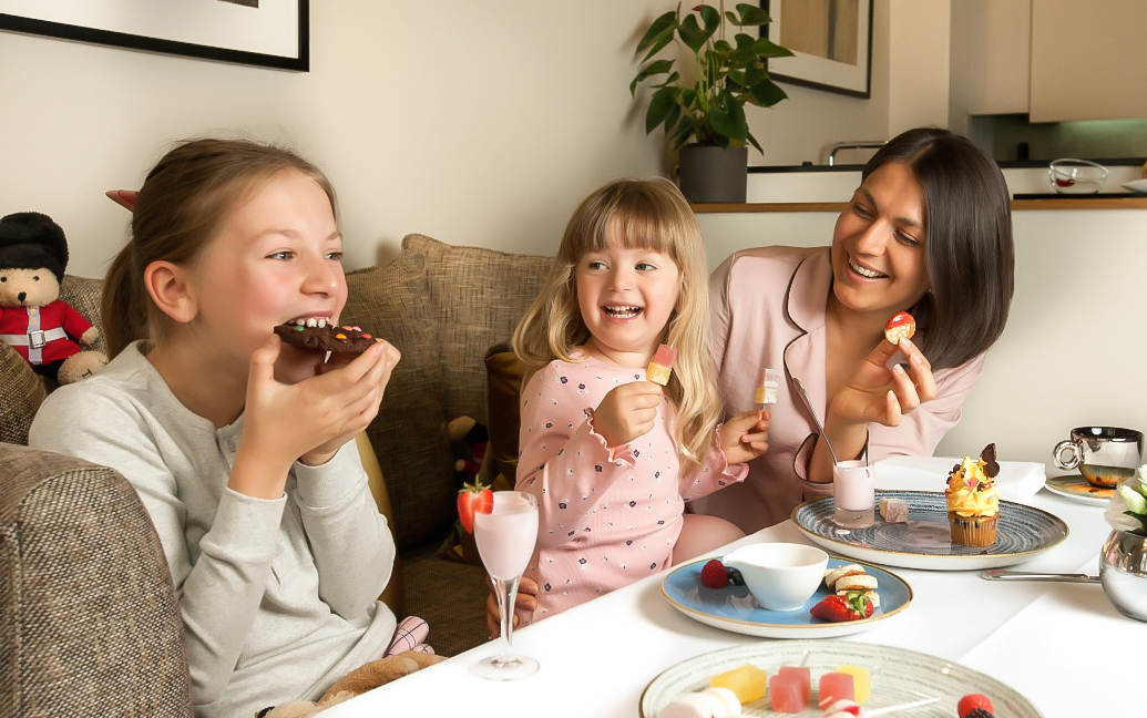 a group of people eating ice cream