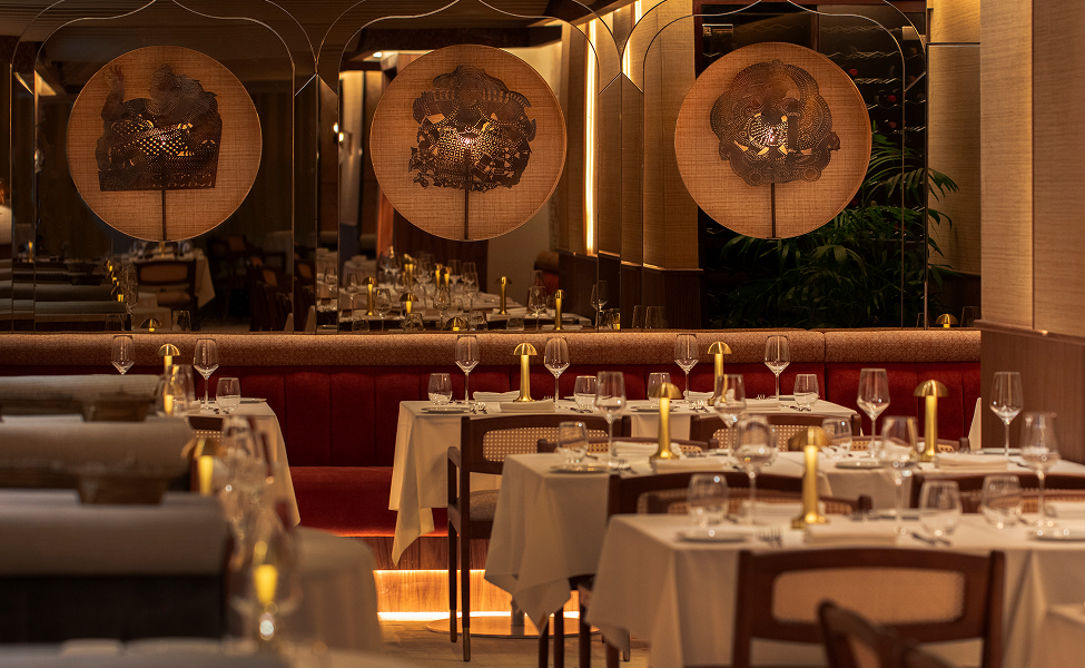 a restaurant with tables and chairs