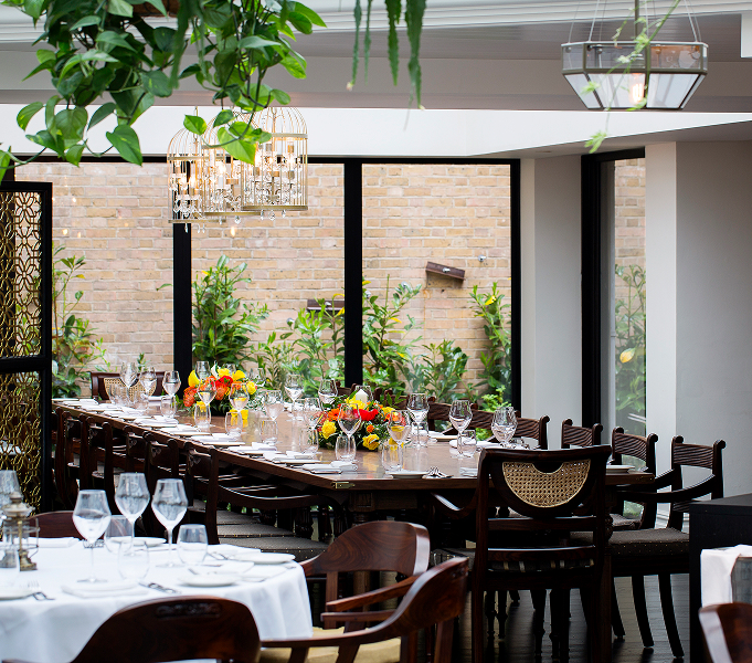 a long table set for a dinner party