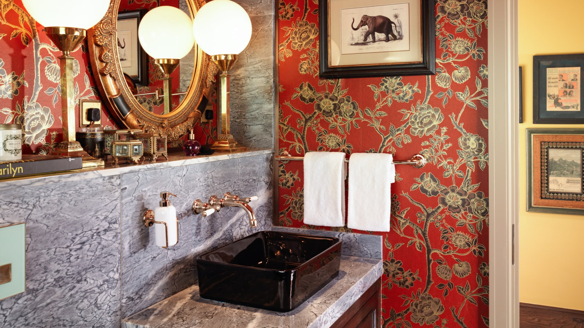 a bathroom with a mirror and a sink