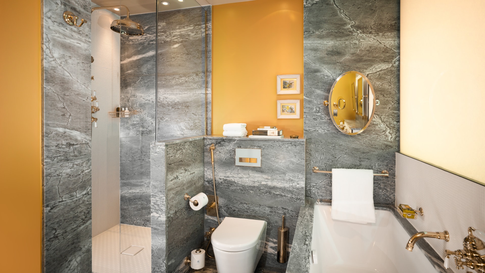 a bathroom with a tub and toilet