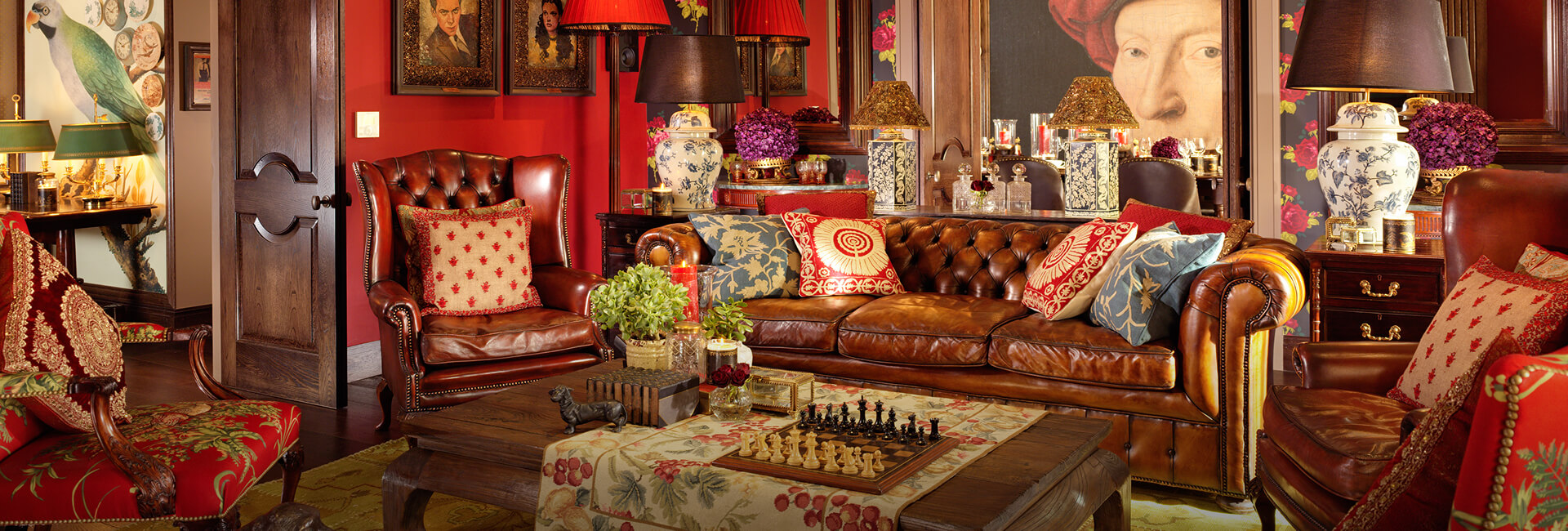 a living room with a couch and chess board