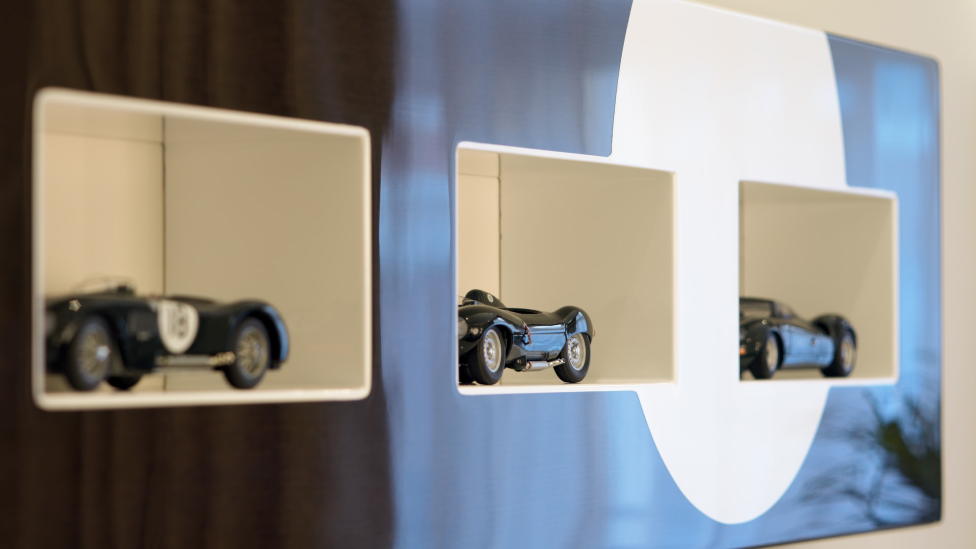 a toy cars in a shelf
