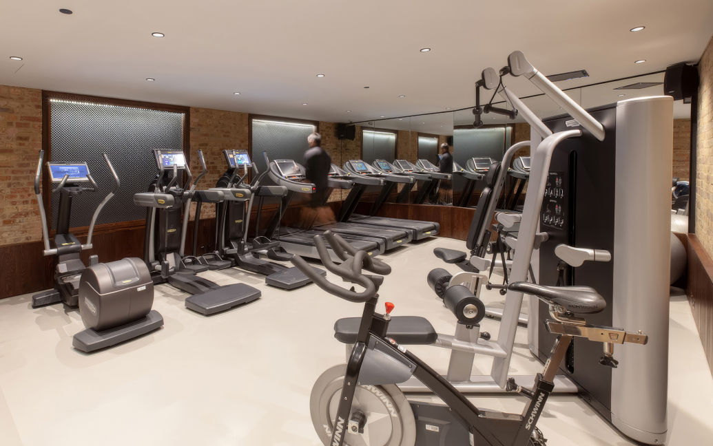 a room with treadmills and exercise machines