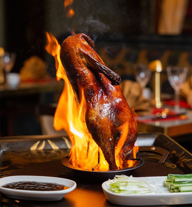 a roast duck on fire