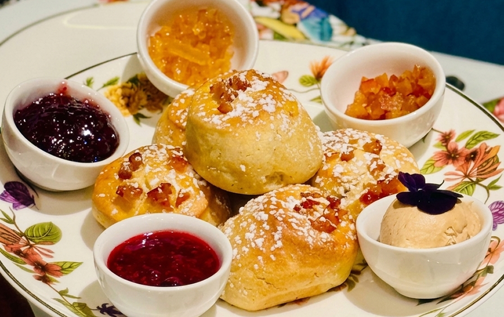 a plate of pastries and jams