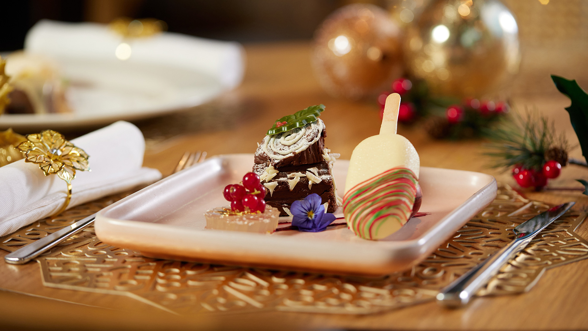 a plate of desserts on a table