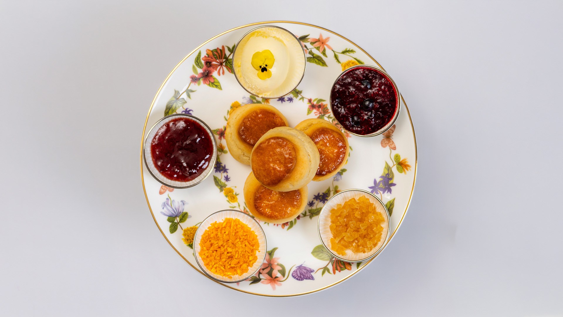 a plate of food on a white surface