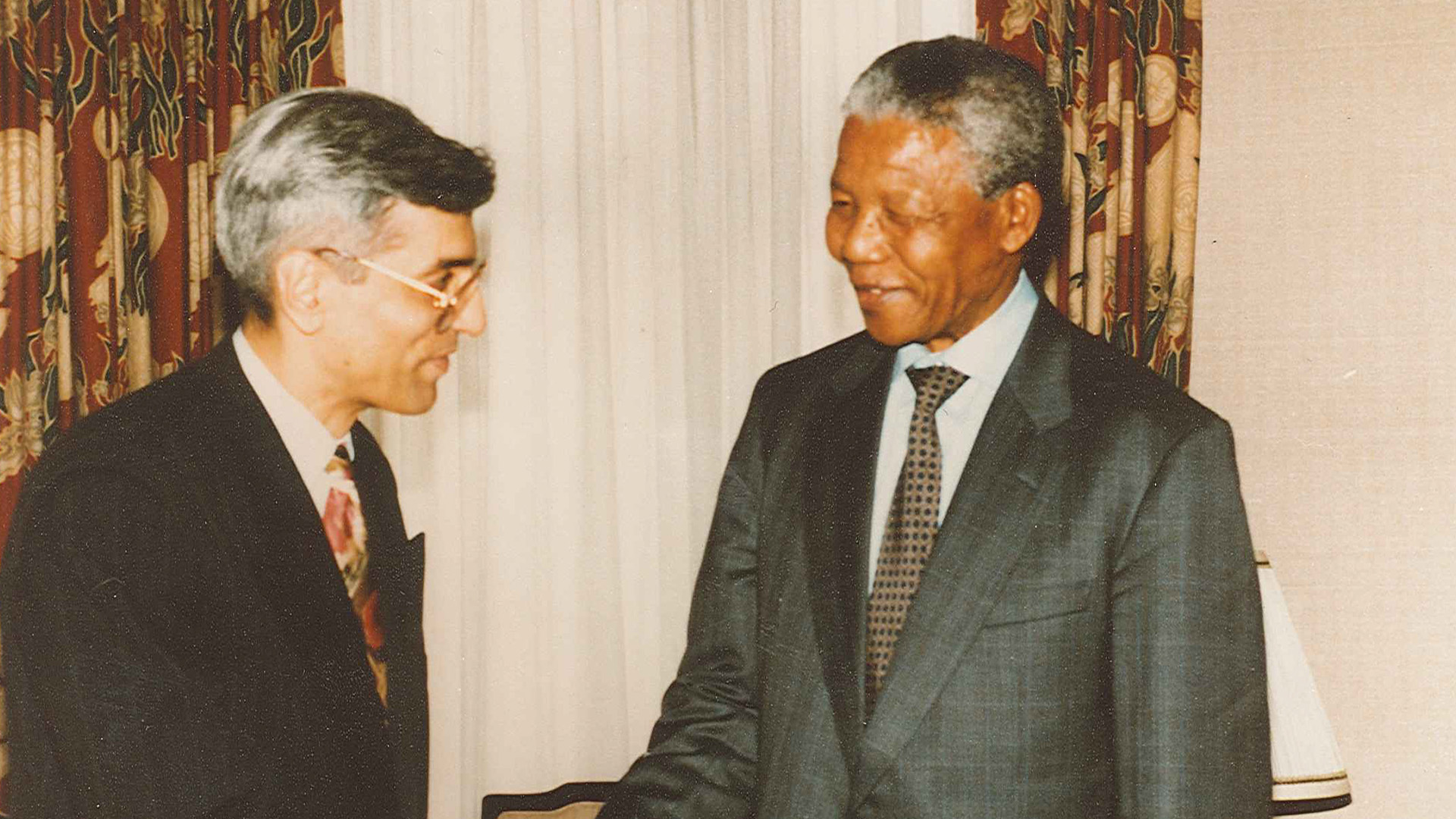 two men in suits and ties