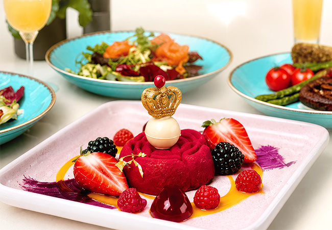 a plate of food with fruit on top