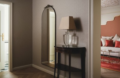 a mirror next to a table