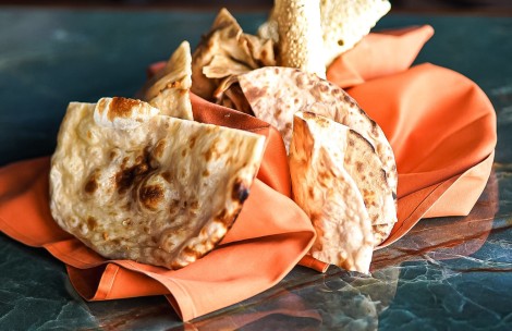 a stack of tortillas on a napkin