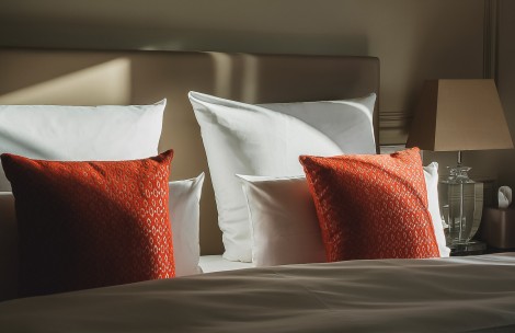 a bed with pillows on it