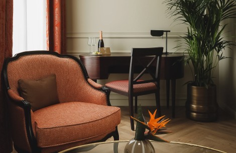 a room with a chair and a desk
