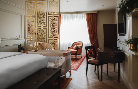 a room with a bed and a chair