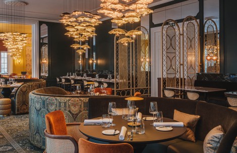 a restaurant with tables and chairs